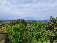 Imóvel em bairro tranquilo com vista das montanhas